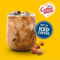 Nestle Professional Coffee mate Hazelnut Nondairy Liquid Creamer Singles, 50 / Box, NES35180