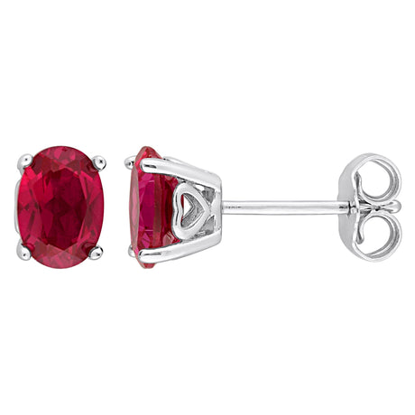 Oval Created Ruby Stud Earrings in Sterling Silver